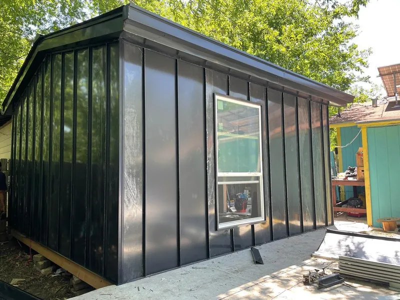 Black standing seam metal wall panels for Metal Roof Installation in Waynesville