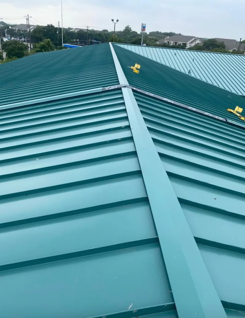Green commercial metal roof ridge and valley for Metal Roof Repair in Waynesville